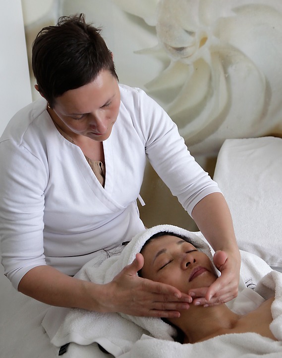 woman having a relaxing facial massage